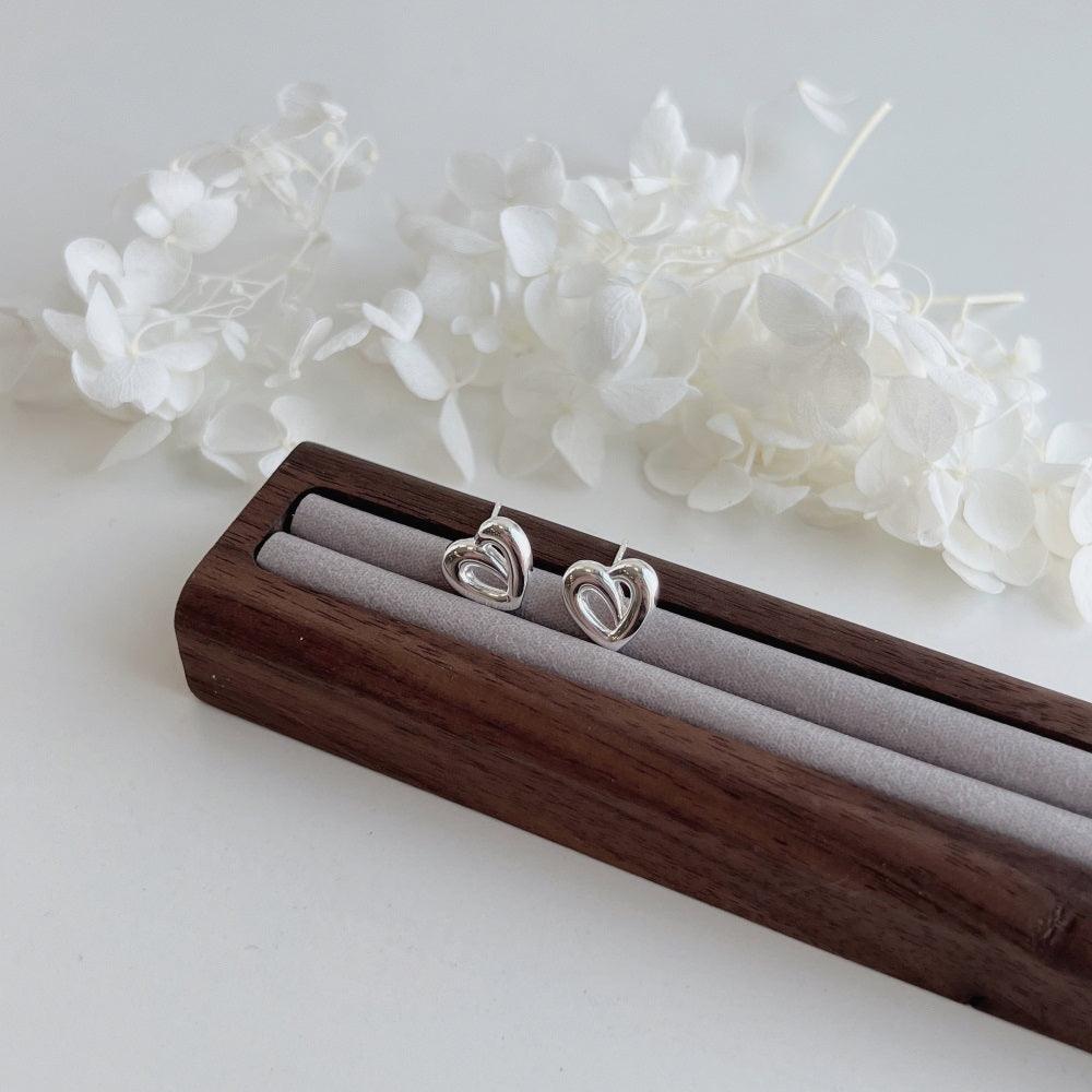 orecchini_donna_in_argento_Cuore_intrecciato - cucciolagioielli