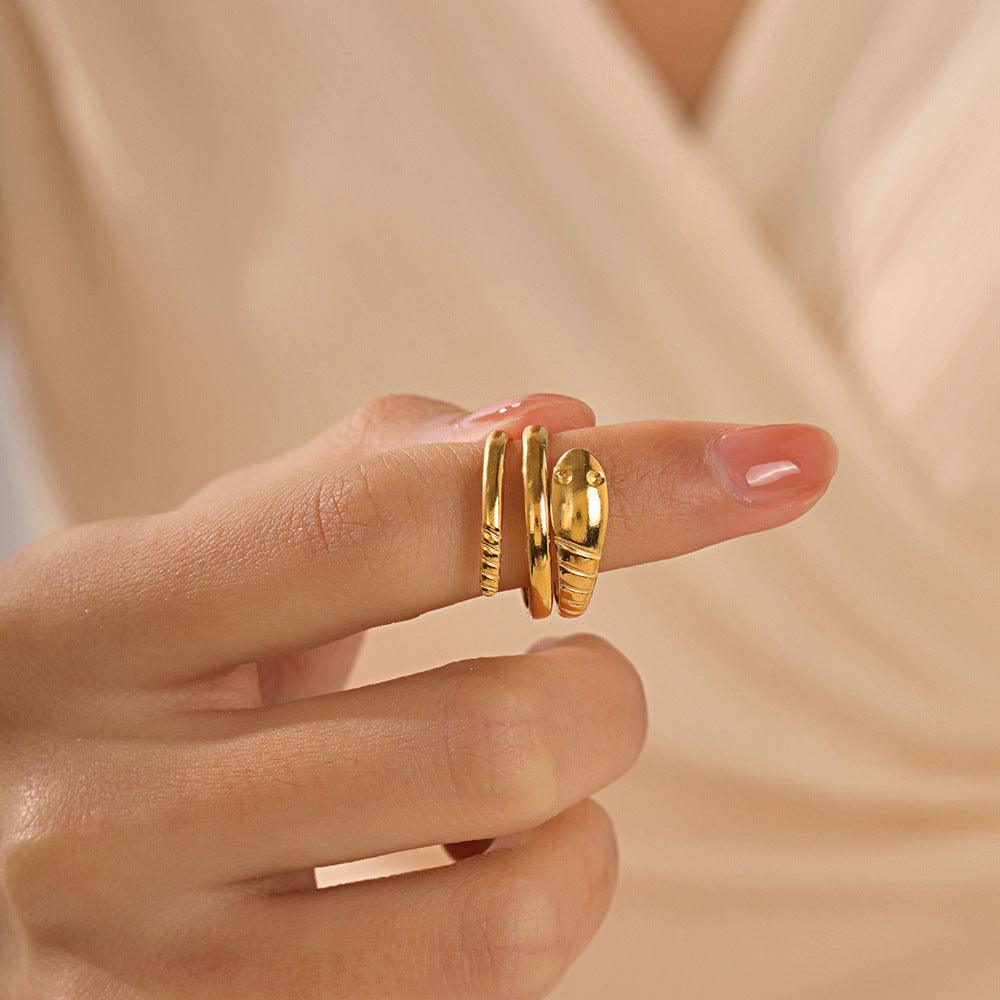anello con serpente in acciaio placcato oro 