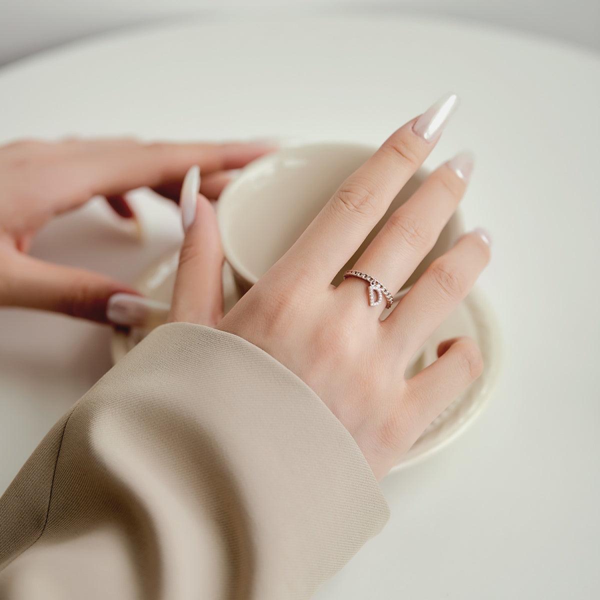 anello iniziali d in argento