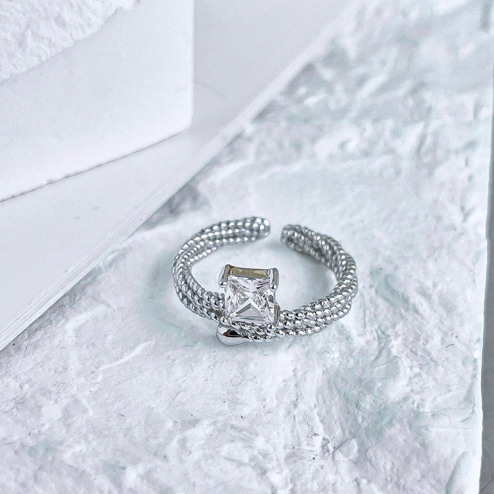 anello_trecce_luminose_in_argento - cucciolagioielli