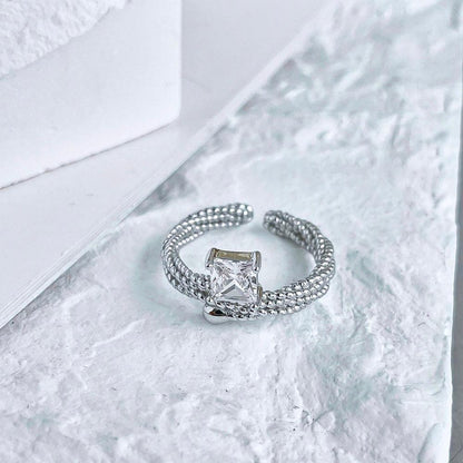 anello_trecce_luminose_in_argento - cucciolagioielli